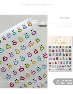 Detail of 3D embossed nail stickers featuring colorful funny cartoon mouth and eye graffiti
