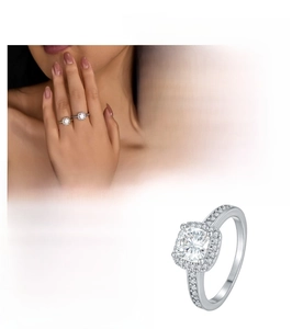 Detail showing halo setting cushion cut moissanite ring with paved band craftsmanship