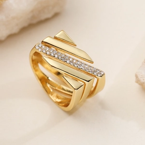 Modern geometric multi-layer gold ring with paved zircon stones in a wide band design