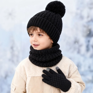 Detailed knit texture of children's winter hat scarf and touchscreen gloves set