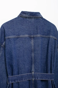 Detail view of the back seams and classic collar on this vintage blue denim jacket