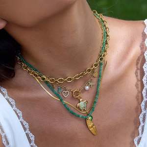 Layered 18K gold plated stainless steel necklace with green beads and sea life pendants
