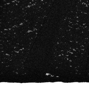 Close-up of black lace fabric with delicate floral patterns and mesh texture on two-piece set