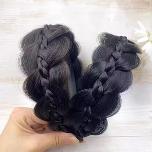 Detail of fishtail braided headband showing thick synthetic fiber texture and matte finish