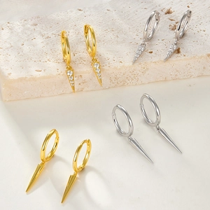 Detail view of S925 sterling silver cone drop earrings in gold and silver plating