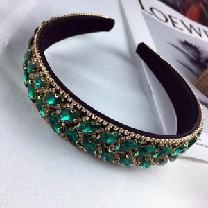 Elegant emerald marquise crystal headband with gold metal base and black velvet lining