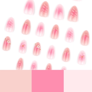 3D floral press-on nails with pink gradient blush effect and almond shape design