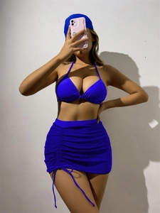 Three-piece royal blue halter neck bikini set with side drawstring skirt and matching headscarf