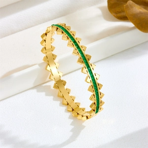Titanium steel bracelet with gold spikes and green square zircon stones in high-end design