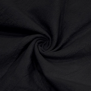 Close-up of black linen fabric texture with detailed cross-weave pattern for men outfits