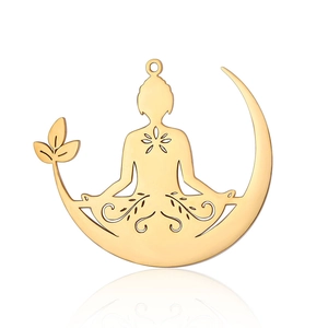 Detailed view of a golden lotus pendant with a Buddha silhouette on a crescent moon design