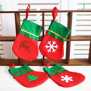 Set of 4 mini red and green Christmas stockings with reindeer and snowflake appliques