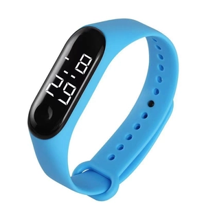 Close-up of blue silicone strap and black LED display showing 8:30 on digital watch