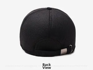Detail view of the black baseball cap back featuring a textured fabric and metal adjustment buckle