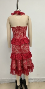 Detailed back view of red lace tiered dress featuring ruffle layers and invisible zipper