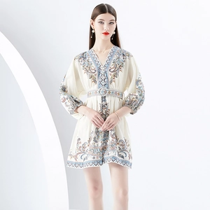 Bohemian V-neck mini dress with vintage blue floral prints and elegant lantern sleeves