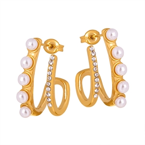 Elegant gold double hoop earrings featuring white pearls and sparkling cubic zirconia stones