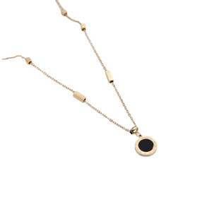 Classic golden necklace with circular Roman numeral pendant and black center inlay
