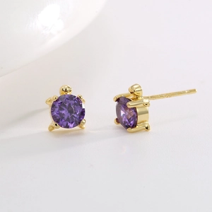 Exquisite gold-plated turtle earrings with purple zircon in a four-prong setting