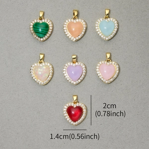 Colorful resin heart pendants with rhinestone border in seven vibrant crystal colors