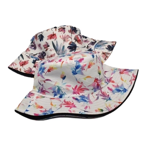 Reversible floral bucket hat for women with colorful print and wide brim sun protection