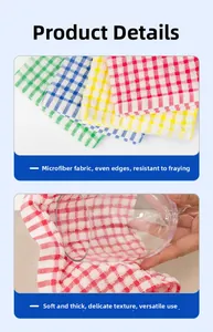 Detail of soft absorbent checkered cotton dishcloth wiping glass cup in a kitchen setting