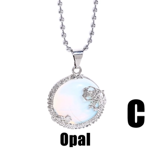 Vintage opal necklace with intricate silver dragon pendant on a minimalist chain
