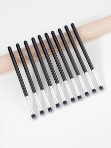 12-piece eye makeup brush set with black glitter handles and silver ferrule on display