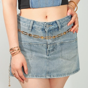 Chic gold metal waist chain with geometric rectangular links worn on a model waist