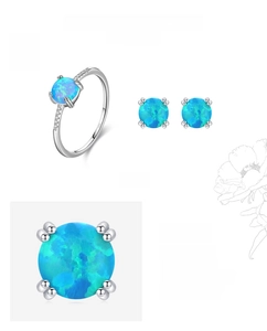 Détail du coffret bague et boucles d'oreilles en argent S925 et opale aux reflets bleu-vert