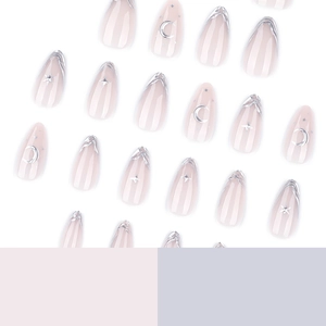 3D silver moon and star press-on nails with French almond shape in nude pink finish