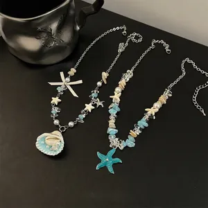 Summer beach style ceramic beaded necklaces with white shell and blue starfish pendants