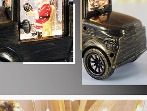 Detail of vintage bronze Christmas truck lantern with Santa Claus and LED glitter effect
