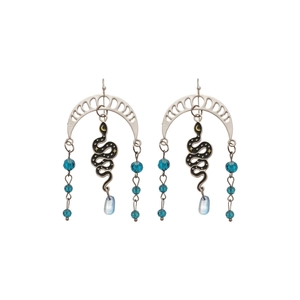 Bohemian silver snake earrings with moon star charms and blue crystal tassels on white background