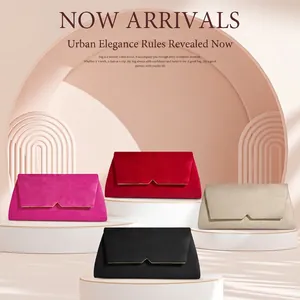 Elegant velvet evening clutches in four colors displayed on white minimalist pedestals