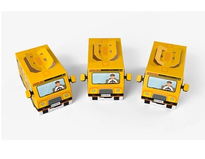 Multiple angles of yellow school bus paper candy boxes for school season parties
