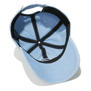 Detail view of the light blue washed cotton baseball cap's inner lining and sweatband