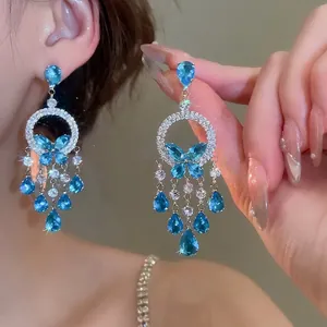 Elegant zircon butterfly tassel necklace set with blue crystal drops in silver finish