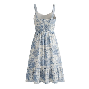 French vintage floral sundress with smocked back and blue flower patterns on white