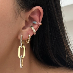 Gold plated earring set with rectangle zircon and chain drops worn on ear model