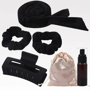 6-piece black velvet heatless hair curler set with scrunchies, claw clip, and spray bottle