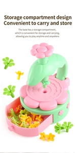 Detail of DIY garden toy flower base featuring a pink storage drawer with plastic accessories