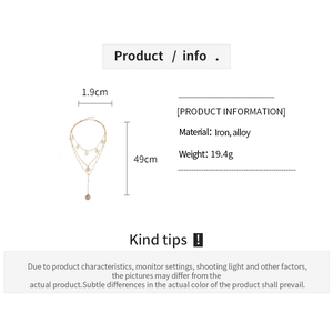 Detailed size and material spec of a triple-layered gold necklace with portrait charms