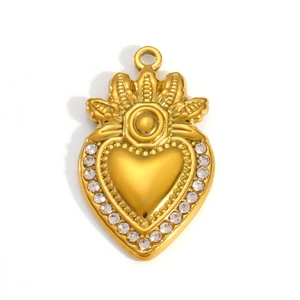 Detailed view of 18K gold plated heart charm with radiant crystal halo and center bead
