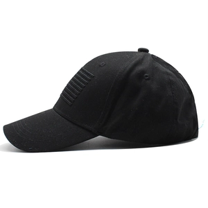 Close-up of tactical black baseball cap with embroidered rectangular stripe details