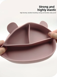 Flexible silicone baby plate showing high elasticity and tear resistance in pink