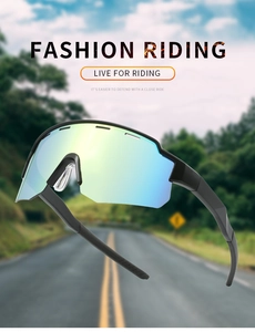Outdoor cycling sunglasses with blue tinted large lens shown against a blurred road background