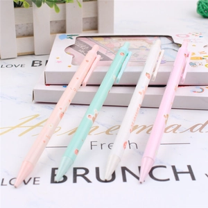 Close-up of four mechanical pencils with strawberry floral patterns and pastel colors