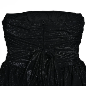 Detail of black glitter tube dress back featuring mesh splicing and invisible zipper