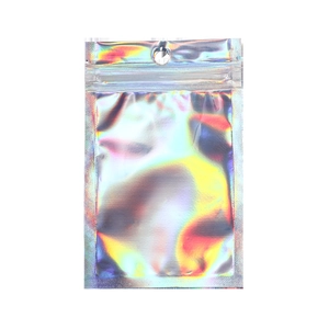 Close-up of holographic laser resealable bag with rainbow reflection and hanging hole